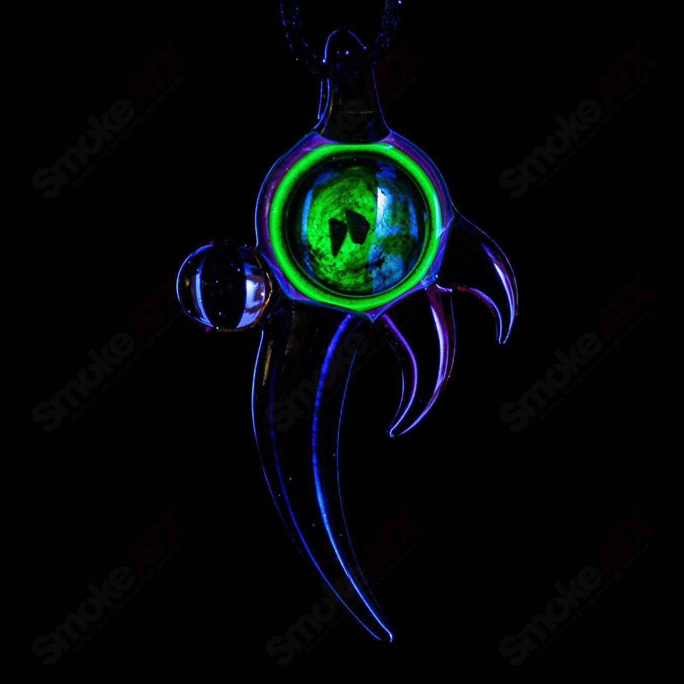 Dosh Glass #5 Amulet Pendant Heady Glass featuring a colorful, handcrafted glass amulet pendant on a chain.