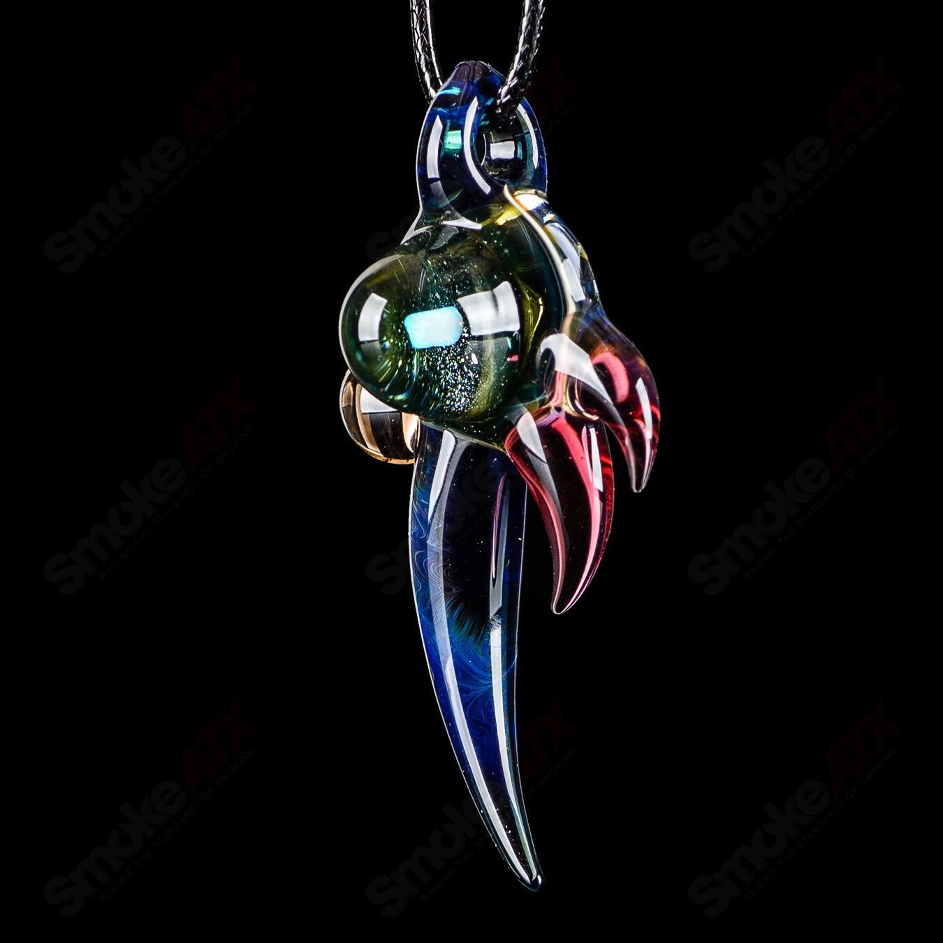 Dosh Glass #5 Amulet Pendant made of colorful Dosh glass with intricate design, hanging as a heady glass pendant.