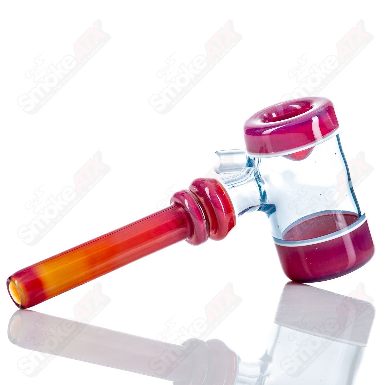 Colorful Kirkland Glassworks #5 Color Poker heady glass hand pipe with vibrant multicolor design and clear glass accents.