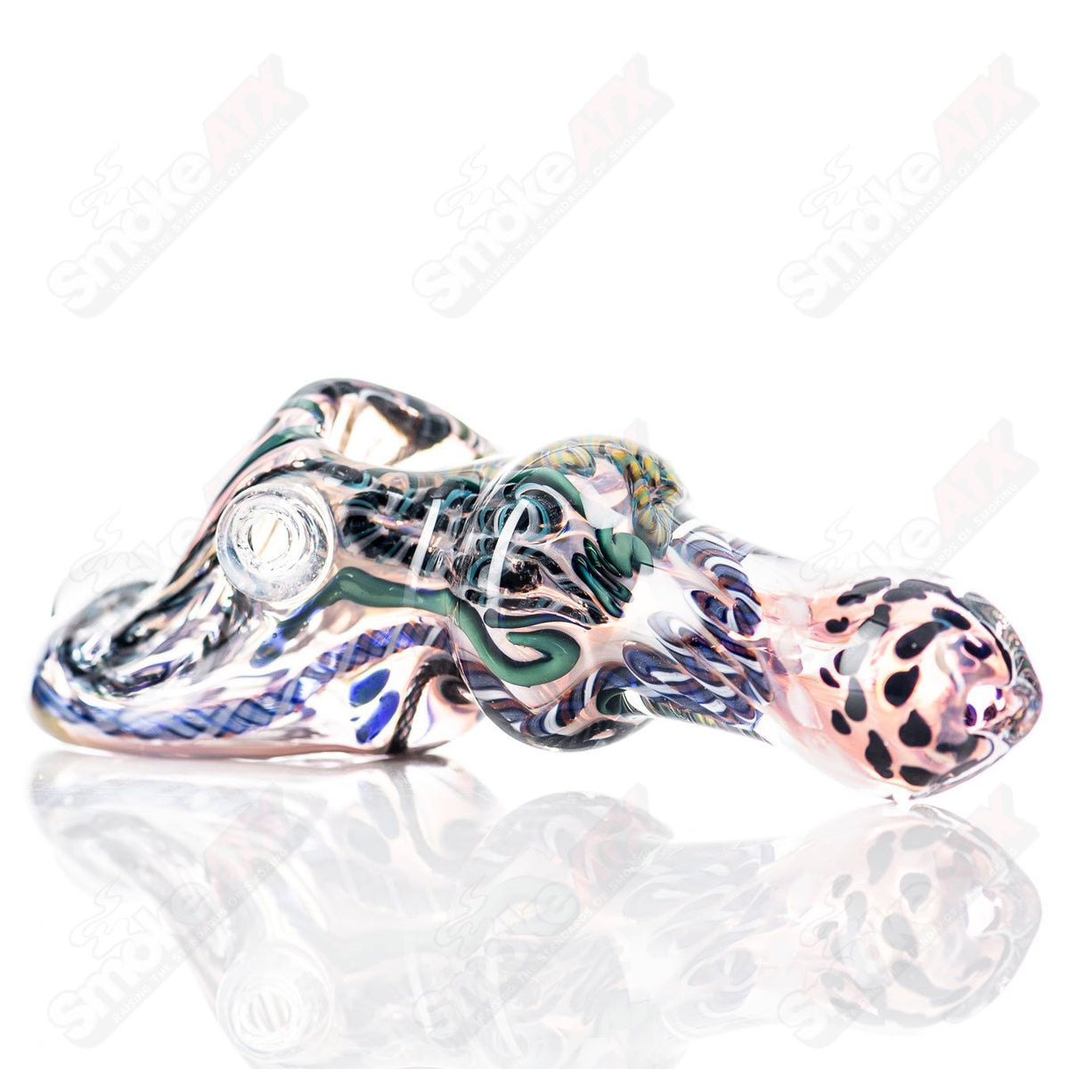 Molten Imagination #5 ISO Montage Chaos Club glass hand pipe with colorful, abstract design and intricate details.