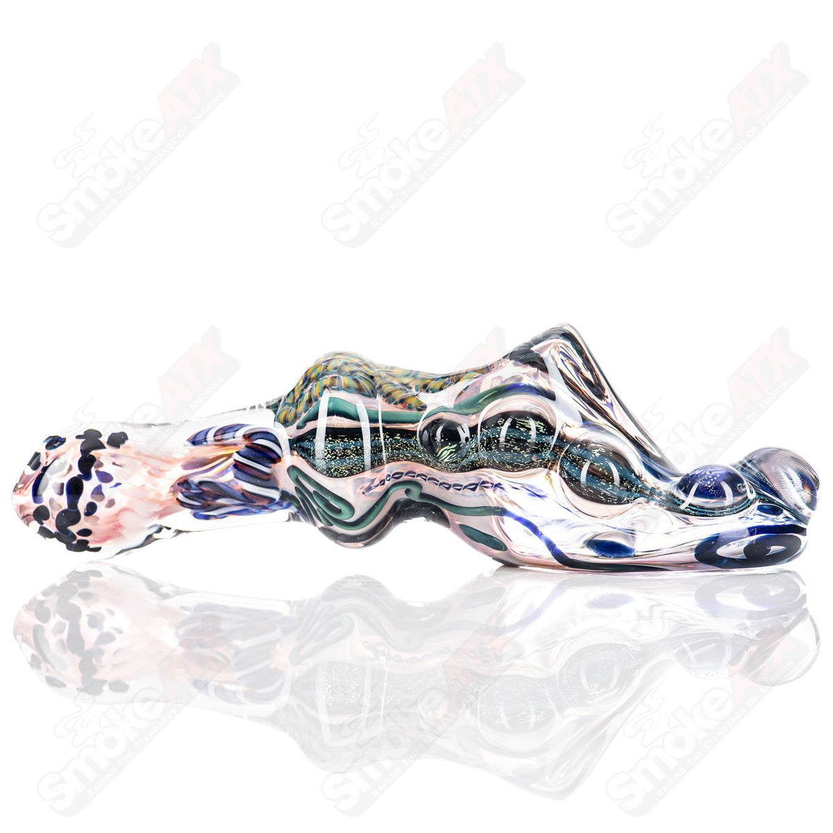 Hand pipe from Molten Imagination's ISO Montage Chaos Club series, featuring colorful glass design and intricate patterns.