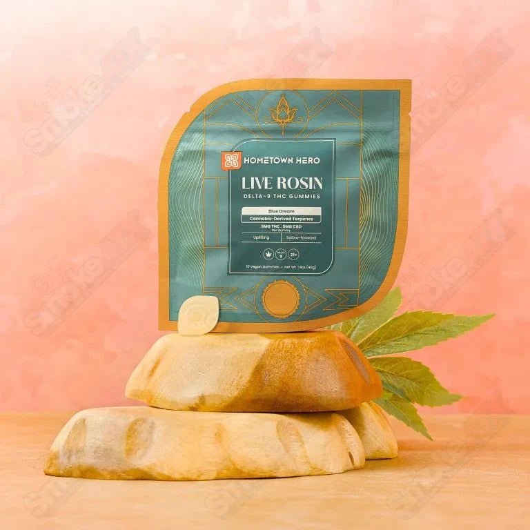 Blue Dream Live Rosin D9+CBD Gummies by Hometown Hero, hemp edibles with 5mg THC and CBD, shown in colorful gummy form.