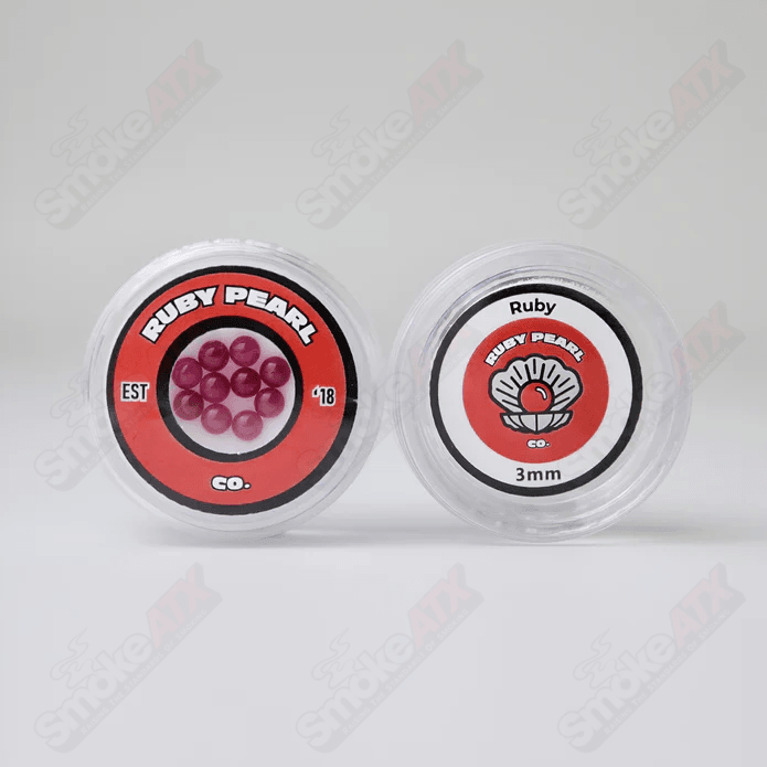 Five 3mm ruby pearls from Ruby Pearl Company, showcasing smooth, round red gemstone pearls for jewelry making.