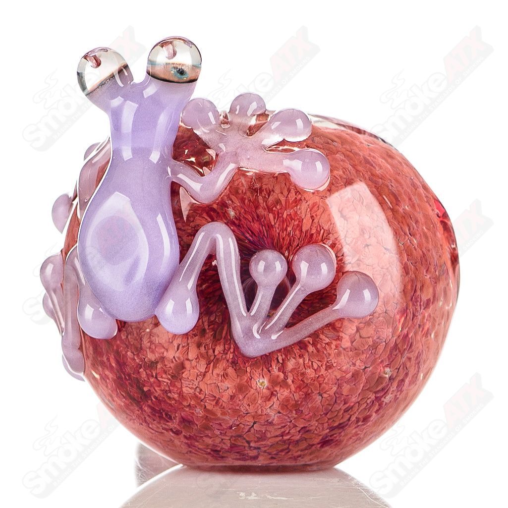 Beezy Glass #6 Frog Spoon pipe made of clear glass with a frog design, showcasing a smooth bowl and curved mouthpiece.