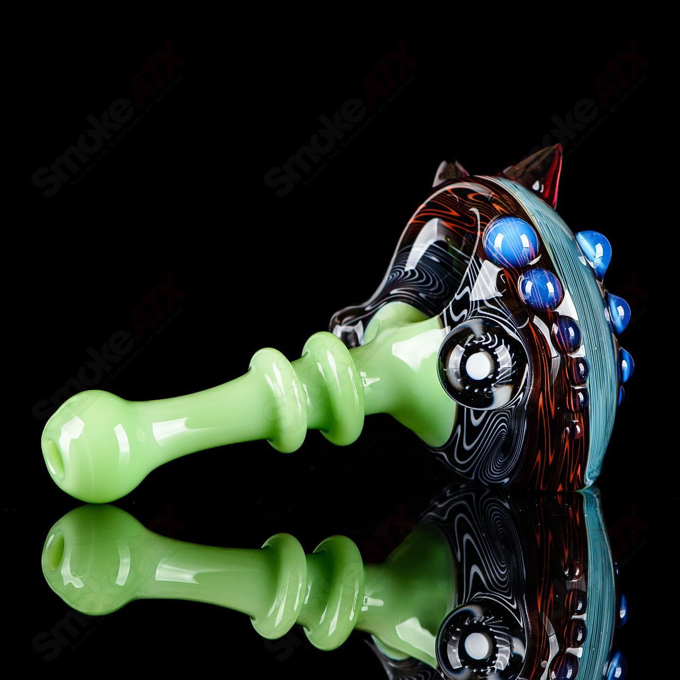 Six-piece hand pipe set by JMass featuring glass spoons with jade mouthpieces, showcasing colorful and artistic heady glass design.