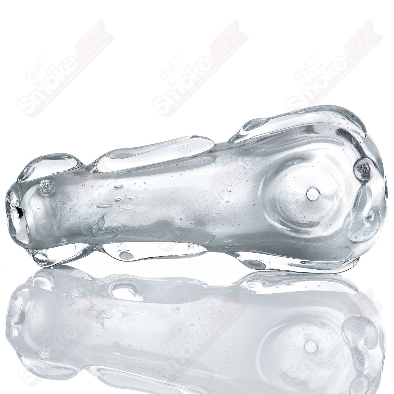 Glass pipe called the #61 Spoon Glass by Nobody, featuring clear glass with smooth curves and a rounded bowl design.
