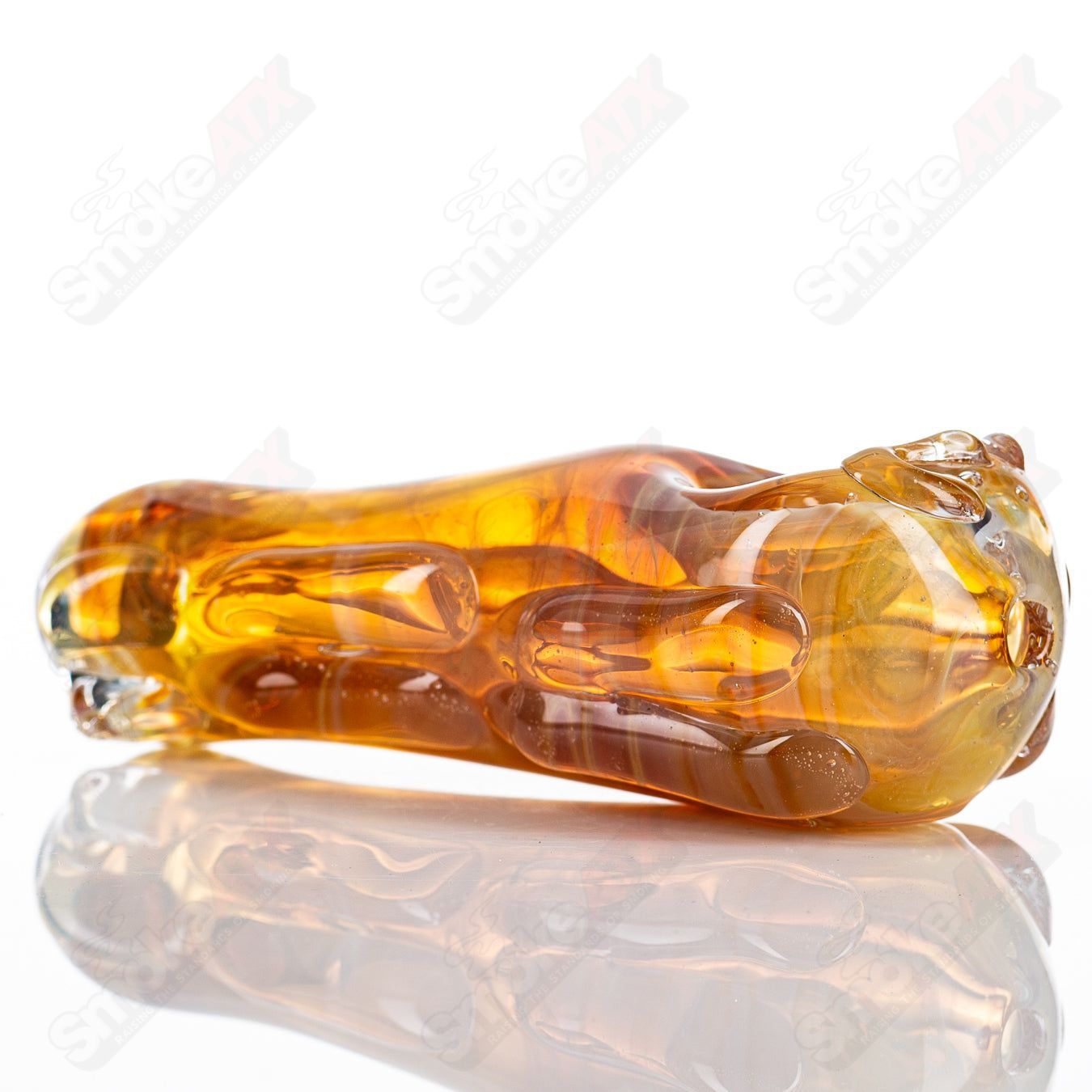 Glass by Nobody 63 Spoon Glass pipe with clear glass, smooth curves, and a rounded bowl for smoking or smoking accessories.