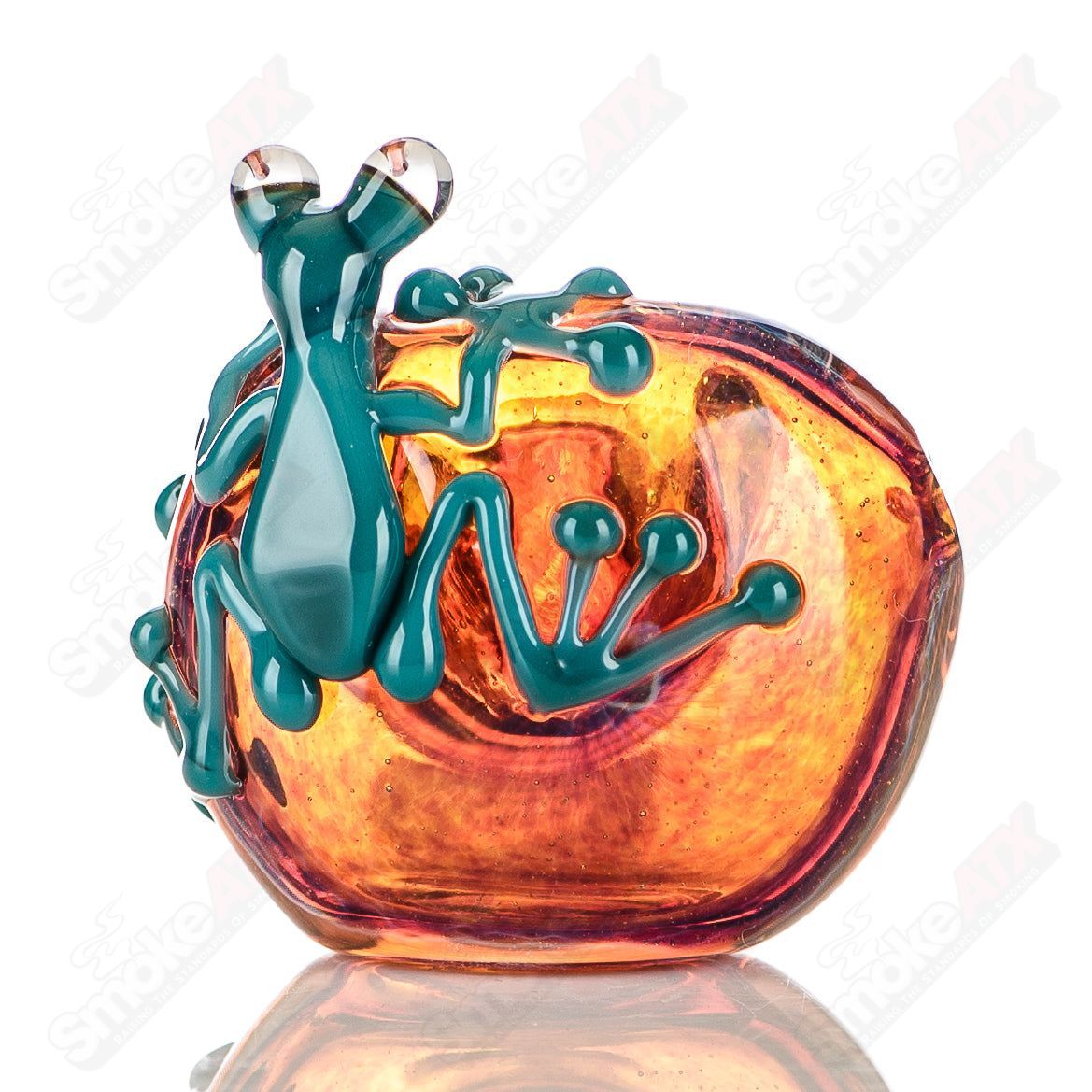 Beezy Glass Frog Spoon Pipe made of clear glass with a detailed frog design, compact and smooth for easy handling.