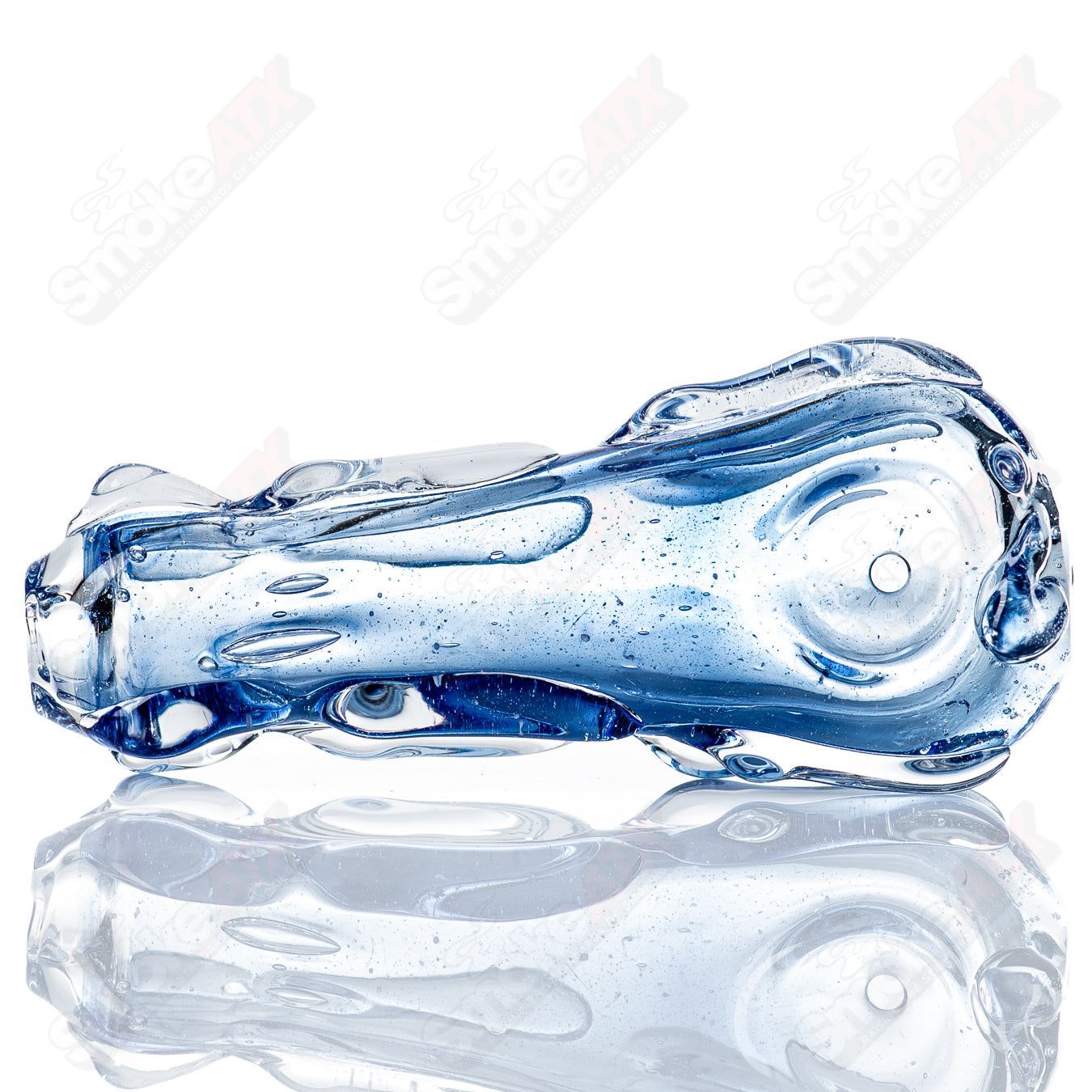 Glass pipe called #70 Spoon Glass by Nobody, featuring a clear glass design with a rounded bowl and smooth mouthpiece.
