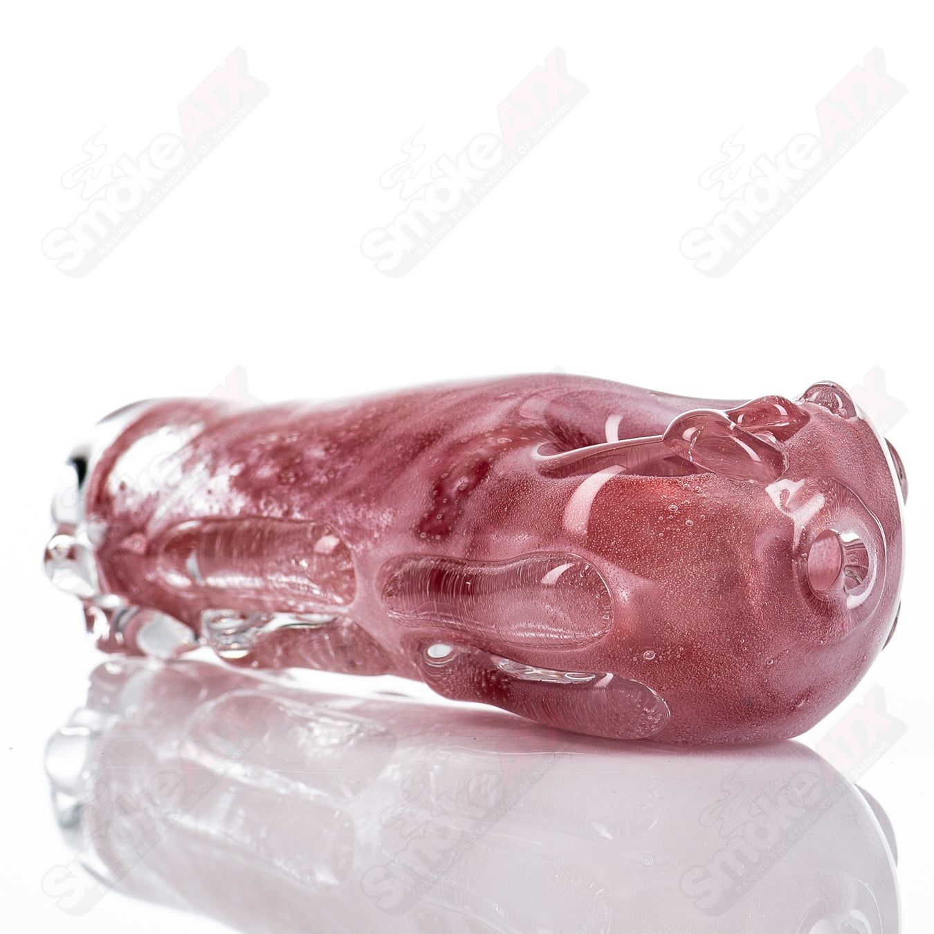 Glass pipe called #73 Spoon Glass by Nobody, featuring a clear glass design with a rounded bowl and smooth mouthpiece.