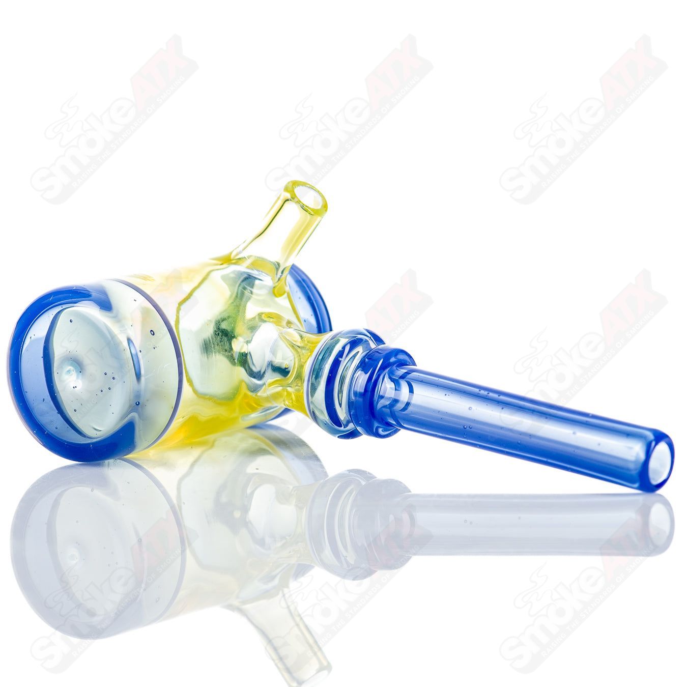 Colorful Kirkland Glassworks #8 Color Poker hand pipe with vibrant glass design for smoking or display.