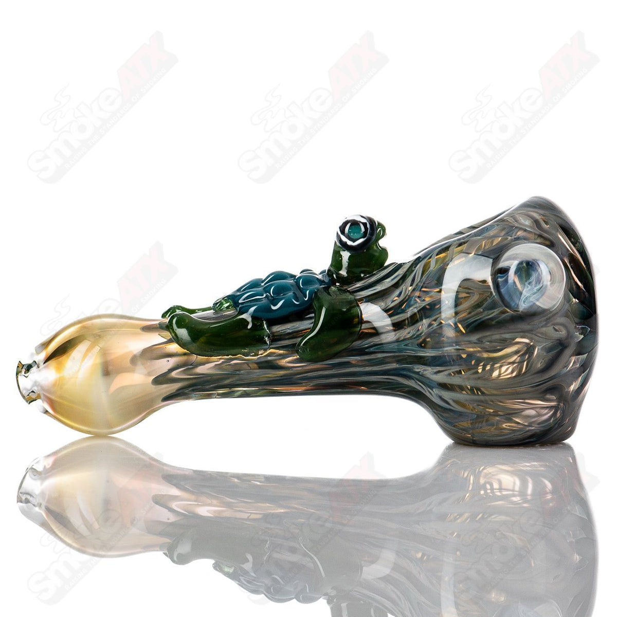 Molten Imagination #8 Critter Spoon hand pipe made of glass, featuring a whimsical critter design and vibrant colors.