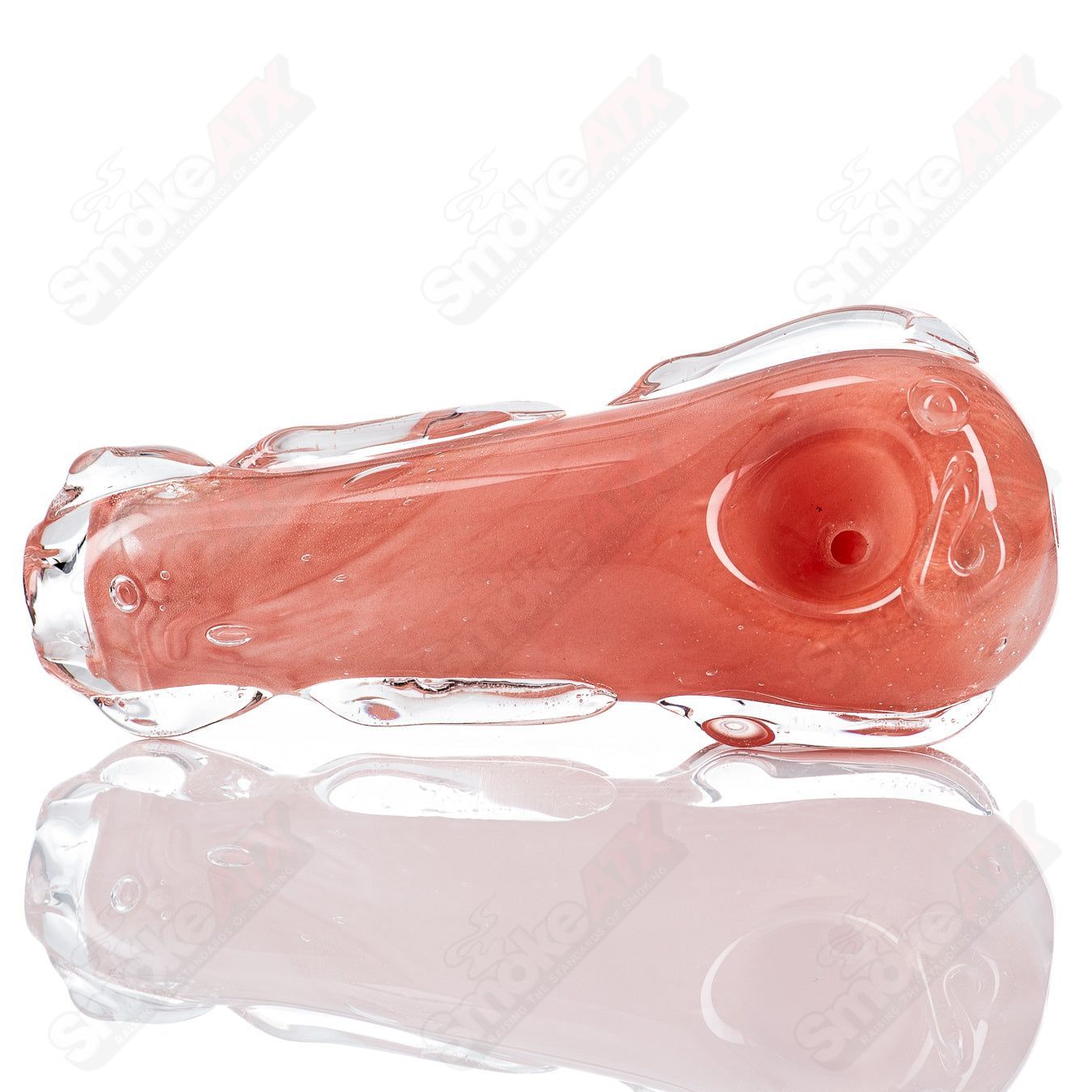 Glass pipe called #81 Spoon by Nobody featuring clear glass with a smooth, rounded bowl and streamlined design.