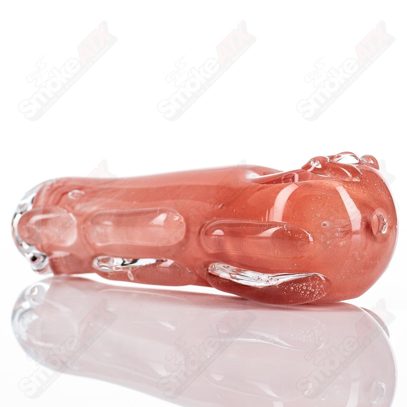 Glass pipe titled #81 Spoon Glass by Nobody, showcasing clear glass with a rounded bowl and smooth design for smoking.