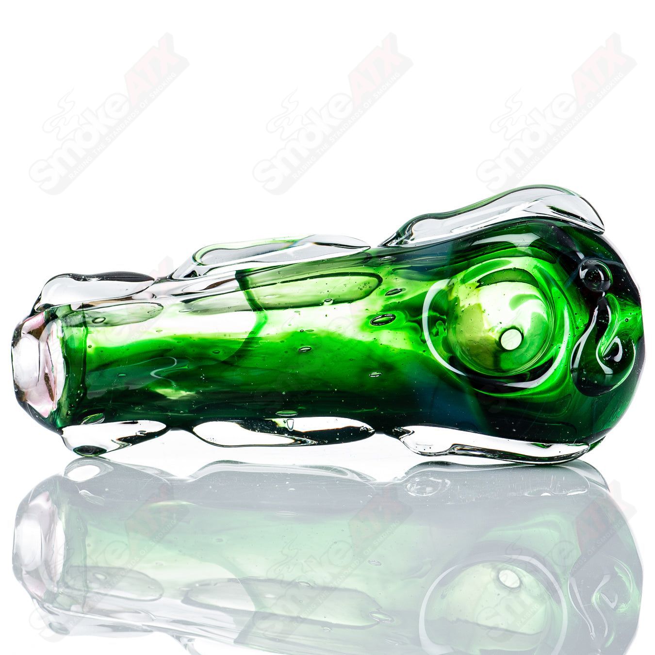 Clear glass spoon pipe by Nobody featuring a smooth, rounded bowl and a short stem, designed for smoking purposes.