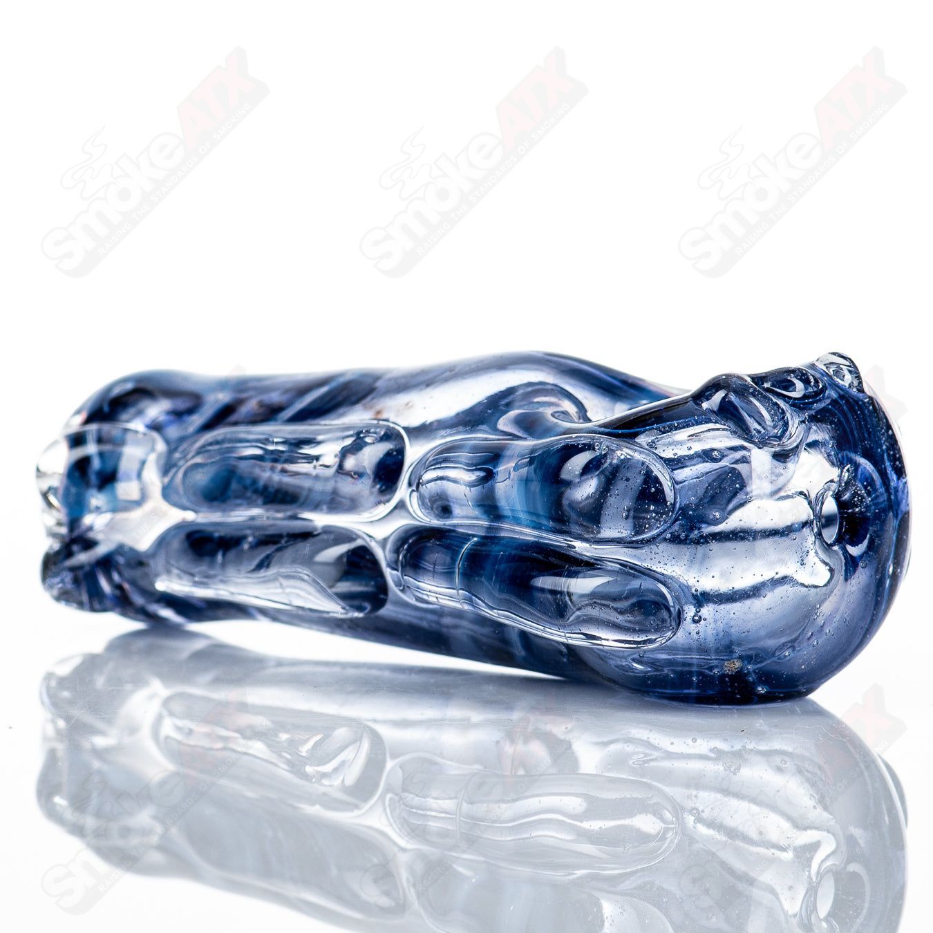 Clear glass spoon pipe, #83 Spoon Glass by Nobody, featuring a smooth, rounded bowl and transparent design for easy use.