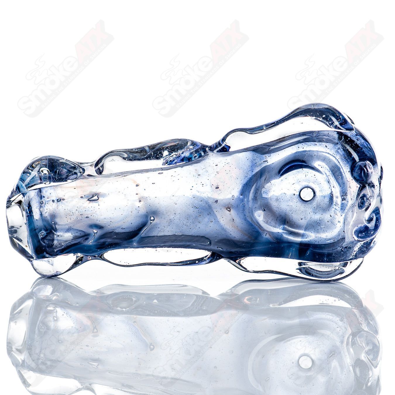 Spoon-shaped glass pipe by Nobody with clear glass and smooth rounded bowl, designed for smoking use.