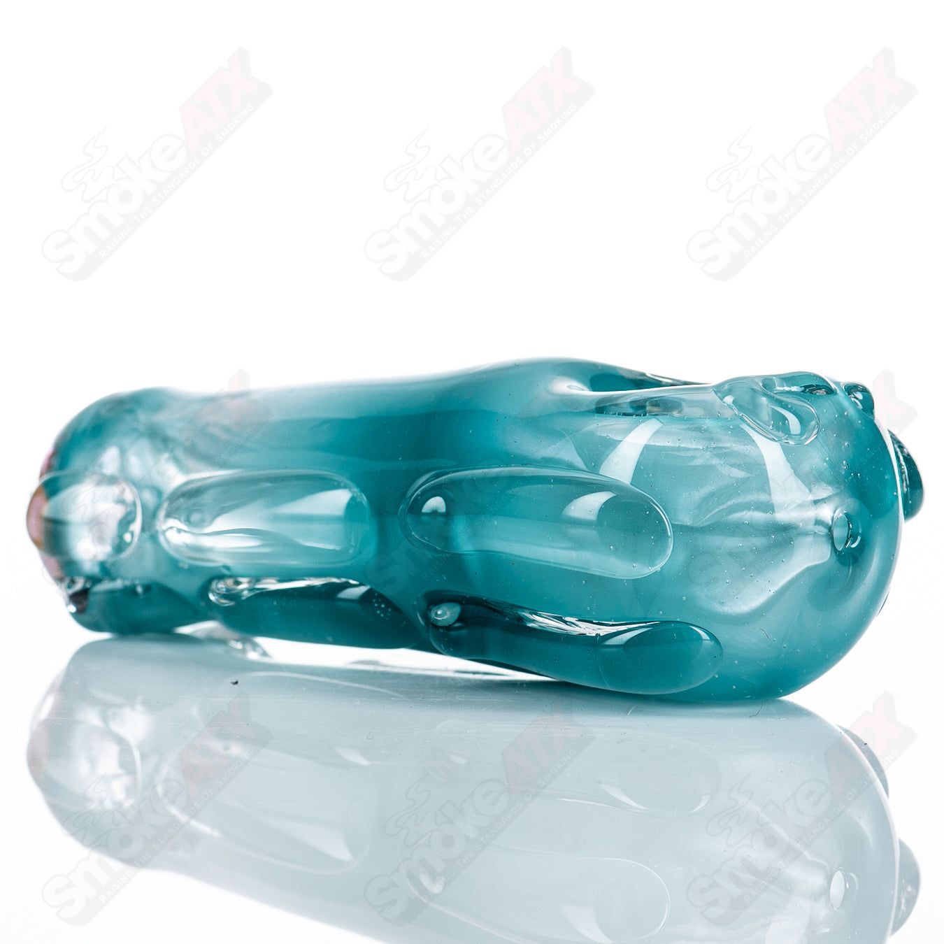 Glass pipe called #85 Spoon Glass by Nobody, featuring a clear glass design with a rounded bowl and smooth handle.