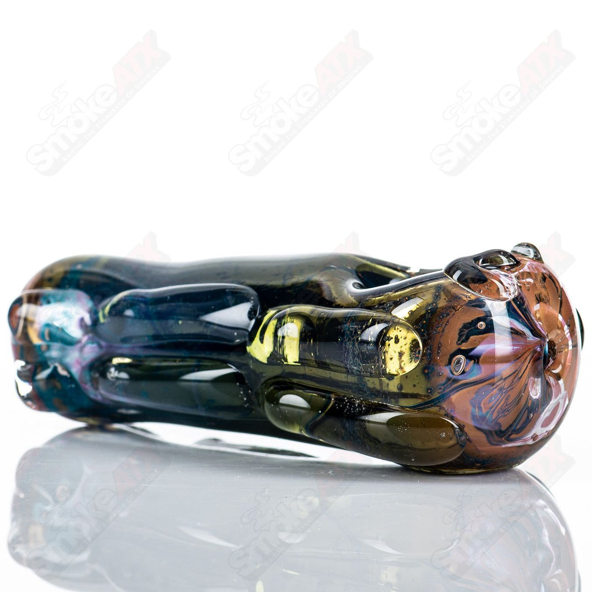 Glass pipe called Spoon Glass by Nobody, featuring a clear, rounded bowl and smooth glass surface for smoking enjoyment.