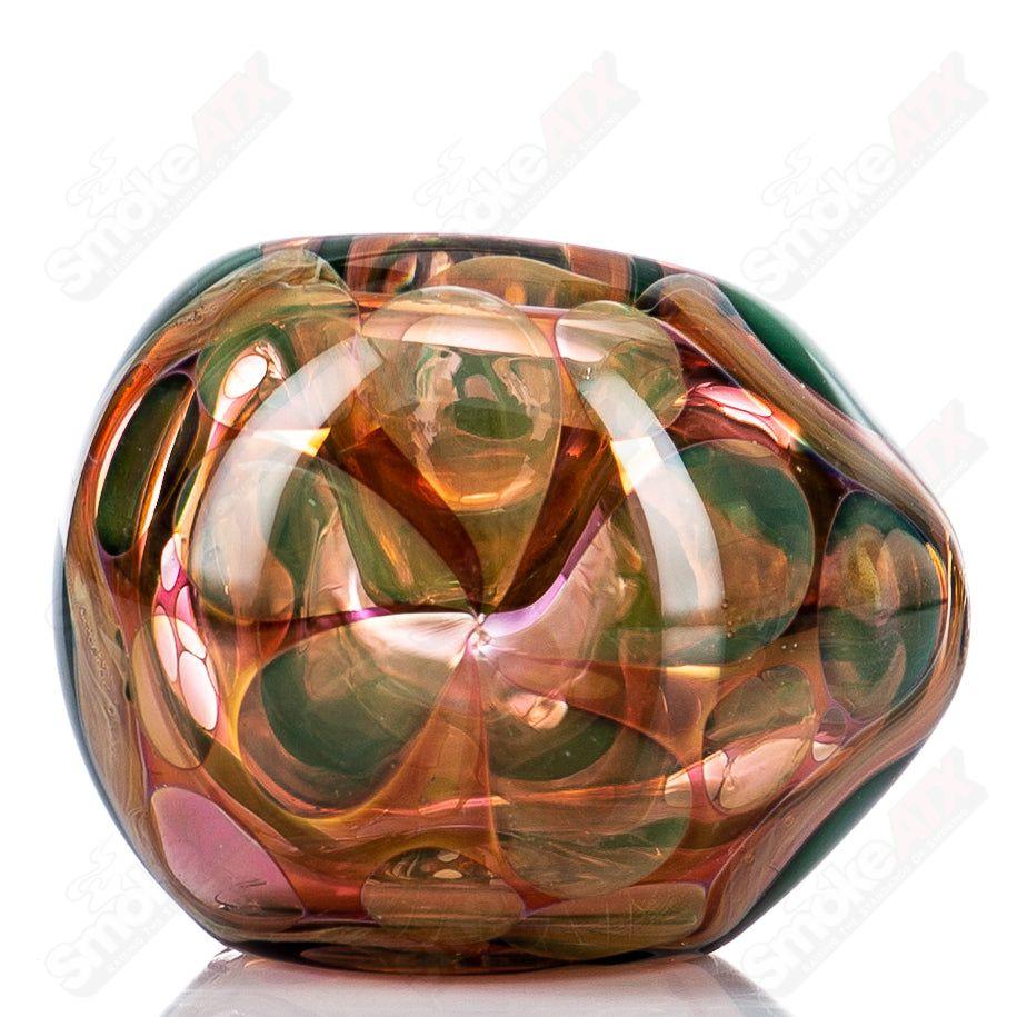Glass pipe by Shane Smith featuring gold and silver fume details, with a classic spoon shape for smoking use.