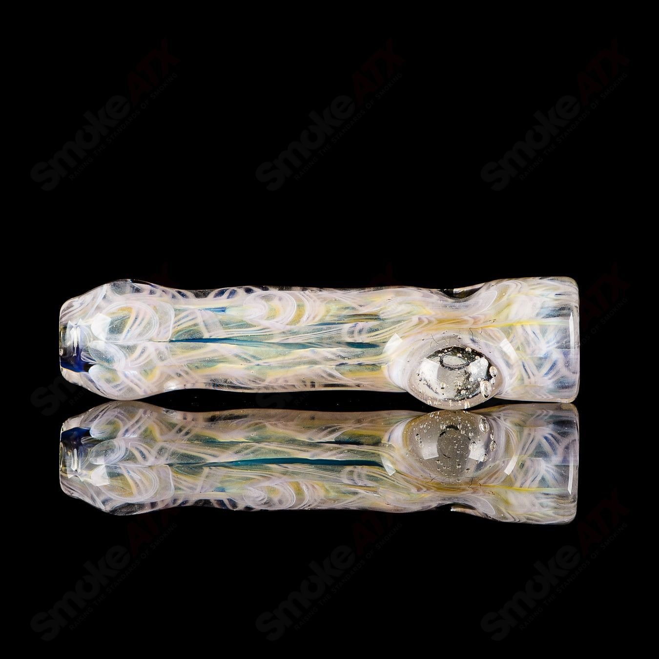 Handcrafted JMK Glass #9 I/O Worked Chillum with signature design, made from clear glass, showcasing intricate worked details.