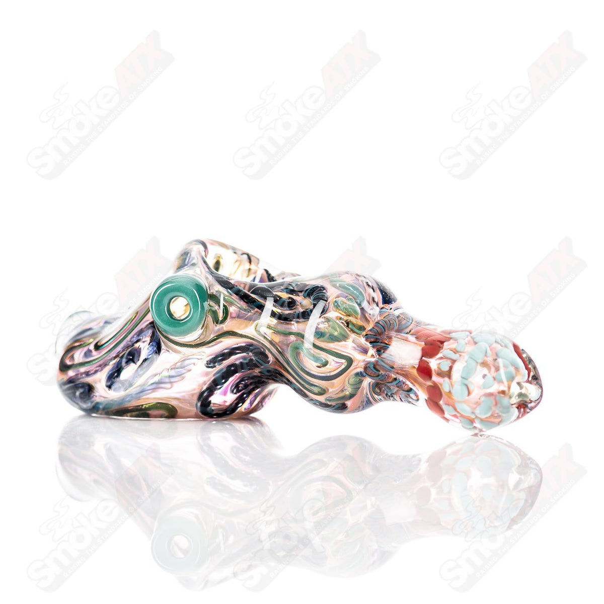 Molten Imagination ISO Montage Chaos Club glass hand pipe with colorful, abstract design and intricate details.