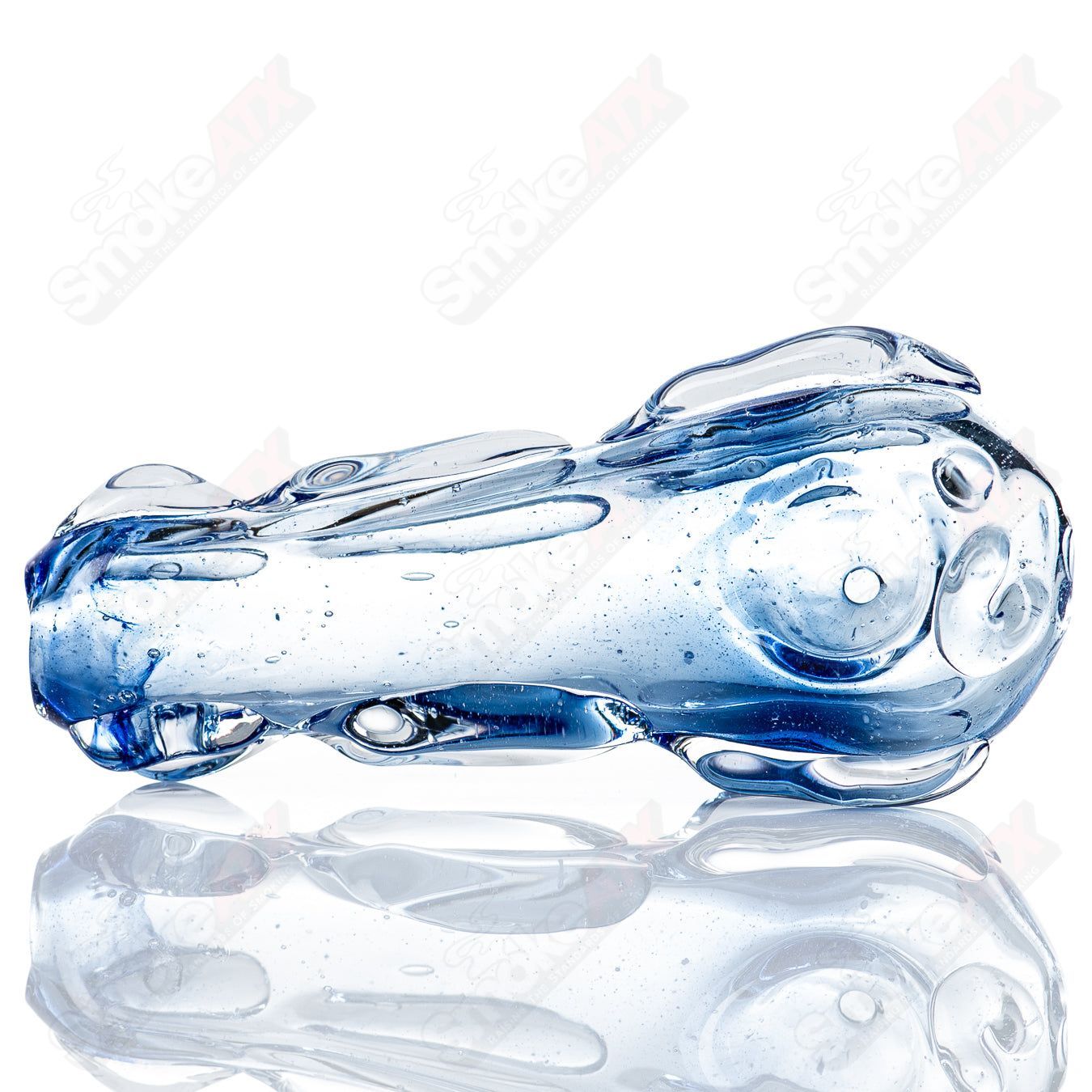 Glass pipe called Spoon Glass by Nobody, featuring a clear, smooth glass design with a rounded bowl and sleek shape.