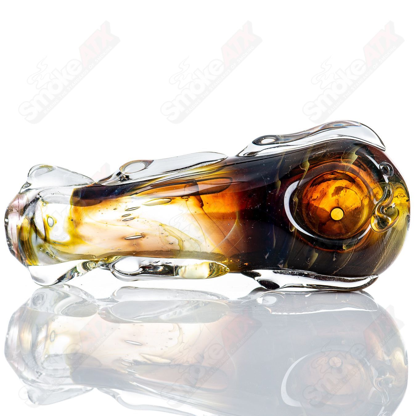 Glass pipe with spoon shape, 99 Spoon Glass by Nobody, clear glass with smooth curves, designed for smoking concentrates or herbs.