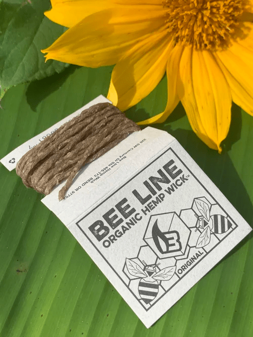9-foot Bee Line hemp wick, natural 420 product for lighting and smoking, shown coiled on a surface.