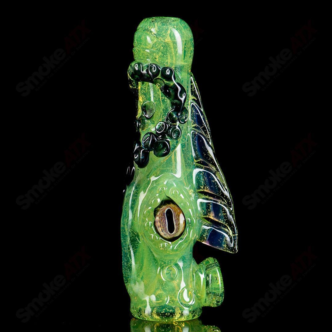 Mako Glass Octopus Chillum, a colorful heady glass pipe with an octopus design, shown on a neutral background.