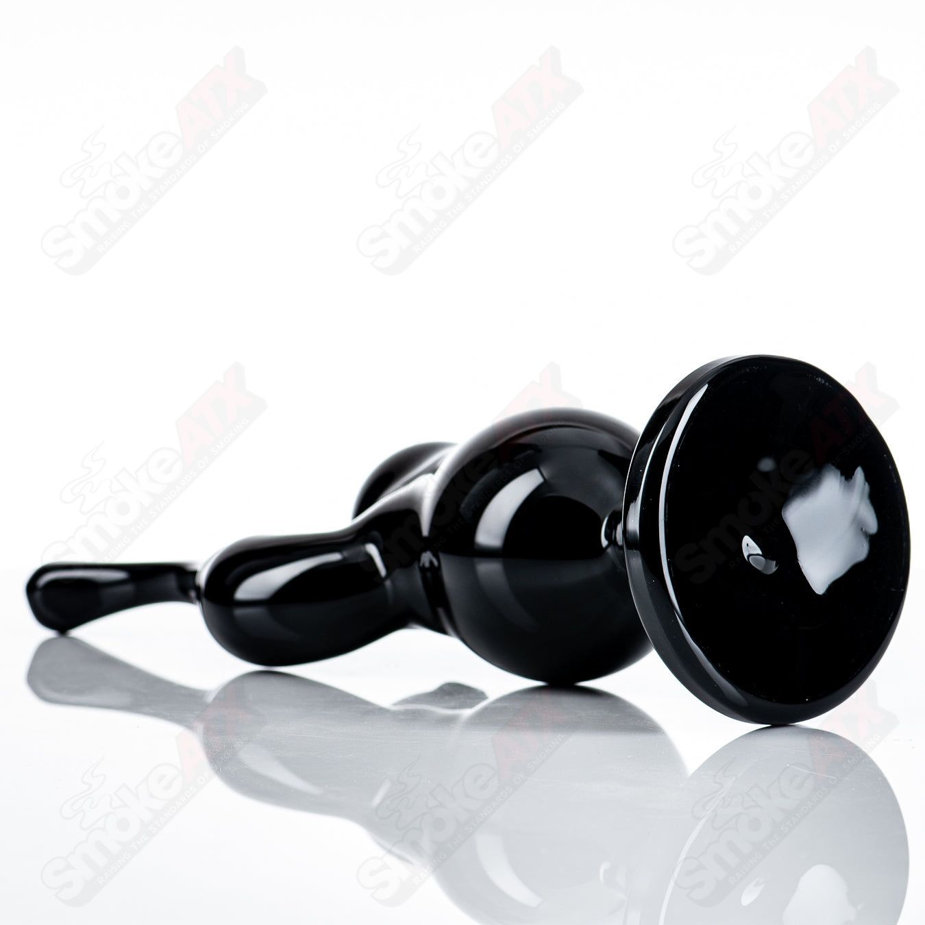 All-black Sherly Bubbler from JMass, a heady glass concentrate rig with a sleek design and bubbler water chamber.