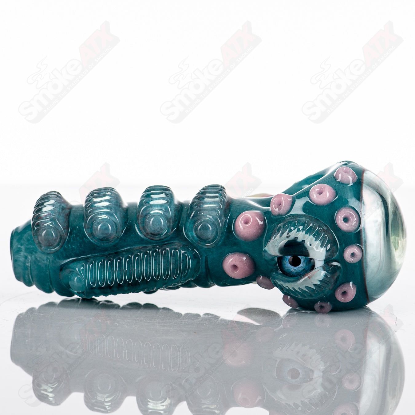 Aqua Azul Ether Spoon by Salt Glass, a vibrant hand pipe with blue and teal glass swirls, crafted by Salt Glass.
