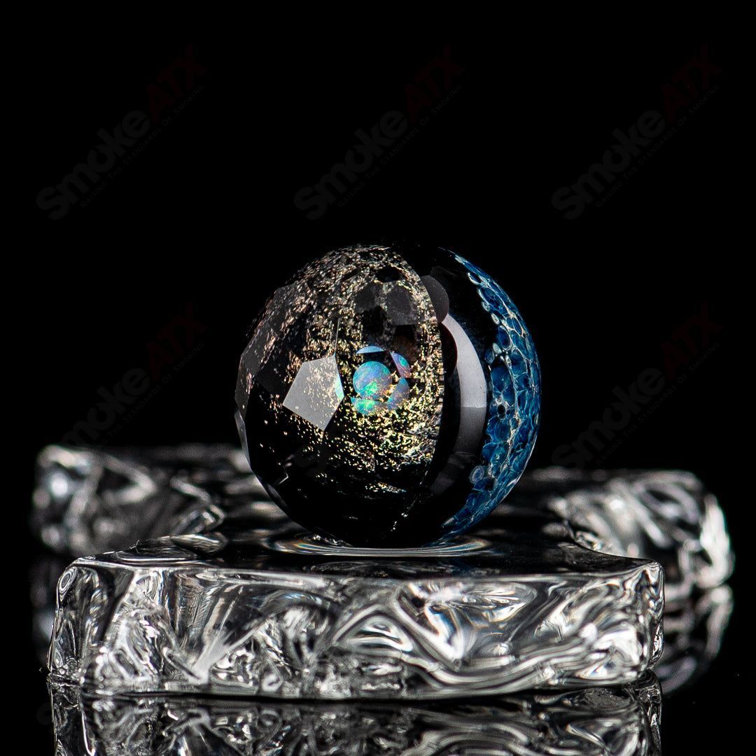 Colorful marble glass marbles from the Eric Mort x Fatal Facets collab, featuring intricate marble patterns and smooth glass surfaces.