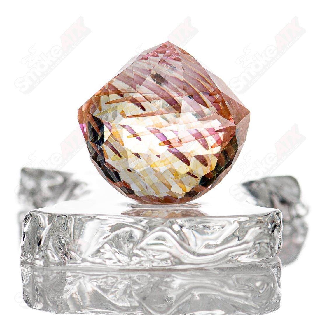 Assorted Solo Marble Fatal Facets glass marbles with swirling marble patterns in vibrant colors and glossy finish.