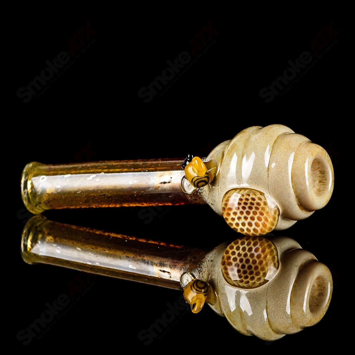 Joe P Glass Beehive Honeycomb Chillum, a colorful heady glass chillum with honeycomb design and intricate glasswork.