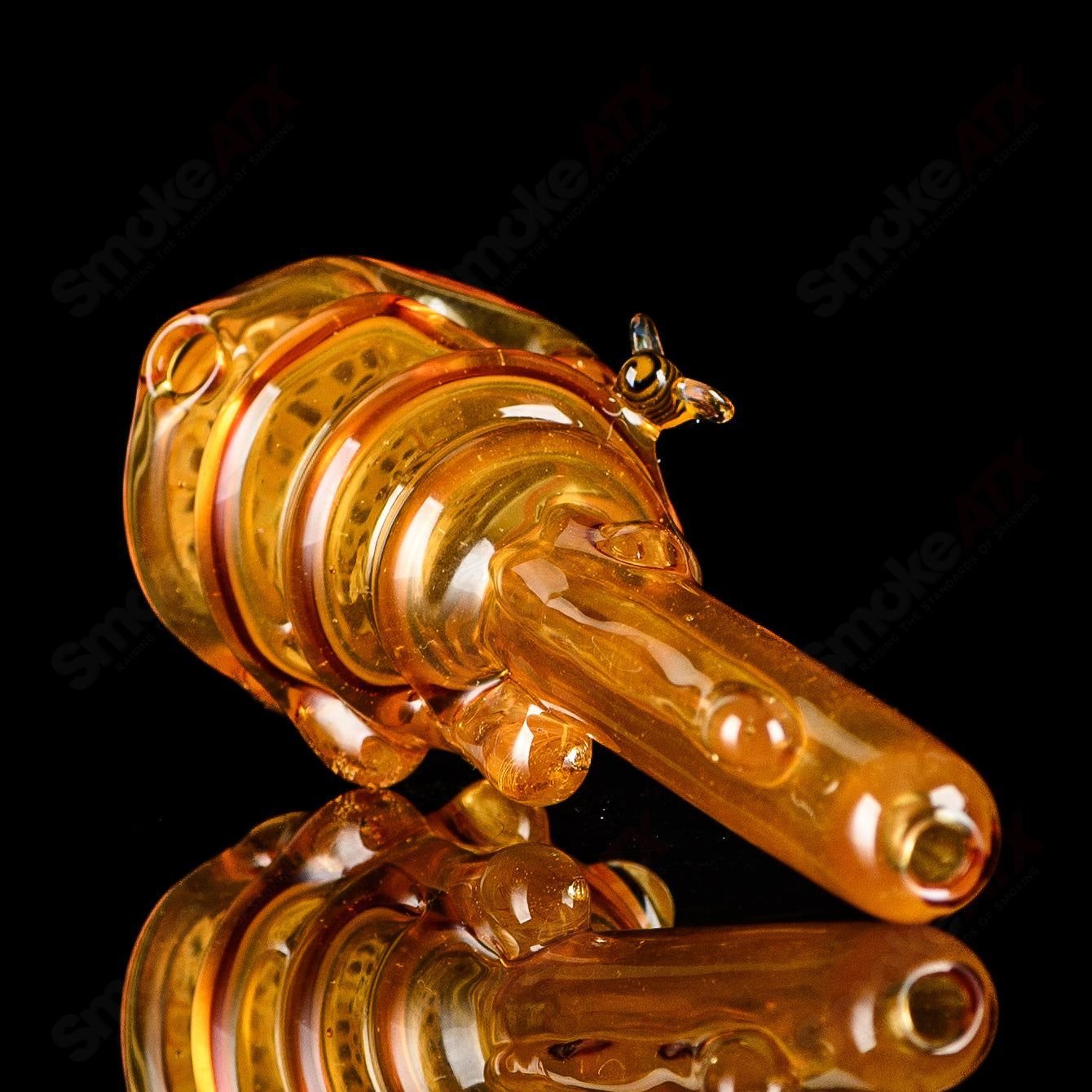 Joe P Glass Beehive Honeycomb Spoon Hand Pipe, colorful heady glass pipe with honeycomb design and ergonomic shape.