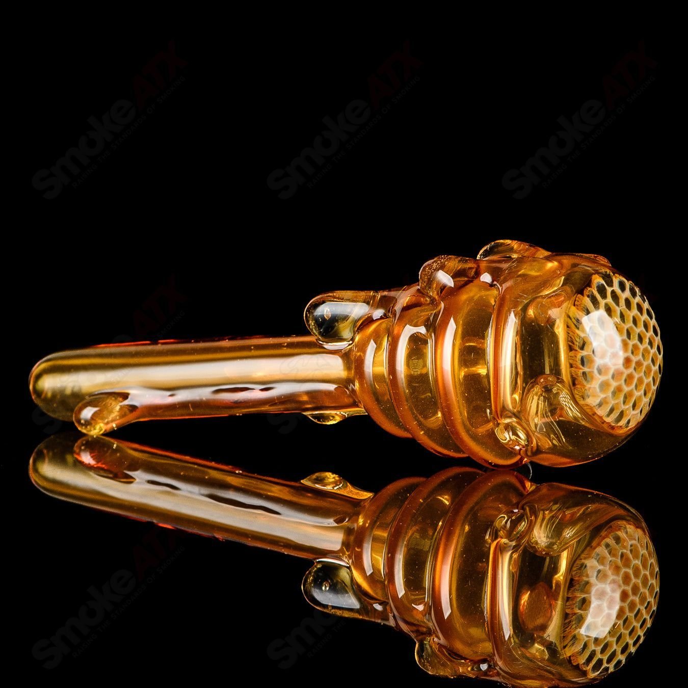 Joe P Glass Beehive Honeycomb Spoon Hand Pipe, colorful heady glass pipe with honeycomb design and smooth mouthpiece.