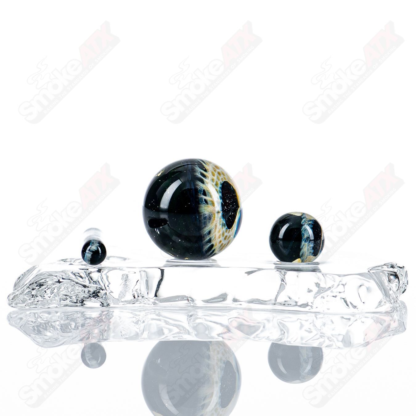 Black Magic Eye Slurper Set by Indo Glass, colorful glass accessories for enhancing smoking experience.