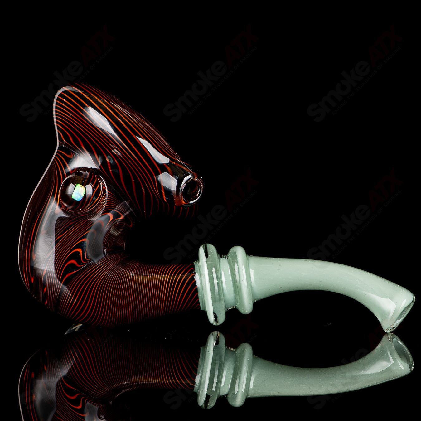 Black and orange Wig Wag Sherlock heady glass pipe with opal accent by JMass, featuring intricate glasswork and vibrant colors.