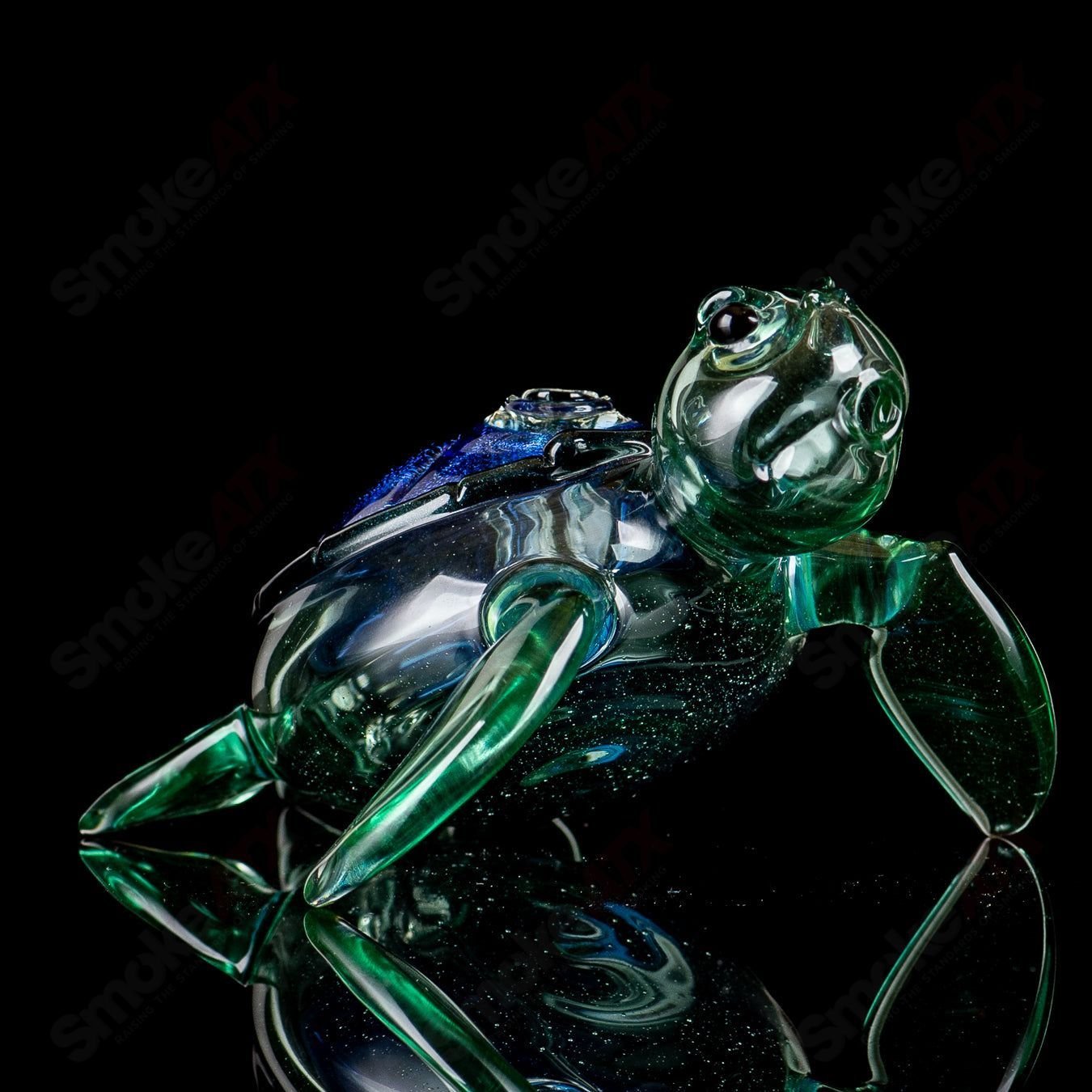 Blue Dichro Honu Sea Turtle rig by Turtle Time, a colorful heady glass concentrate rig featuring a sea turtle design.