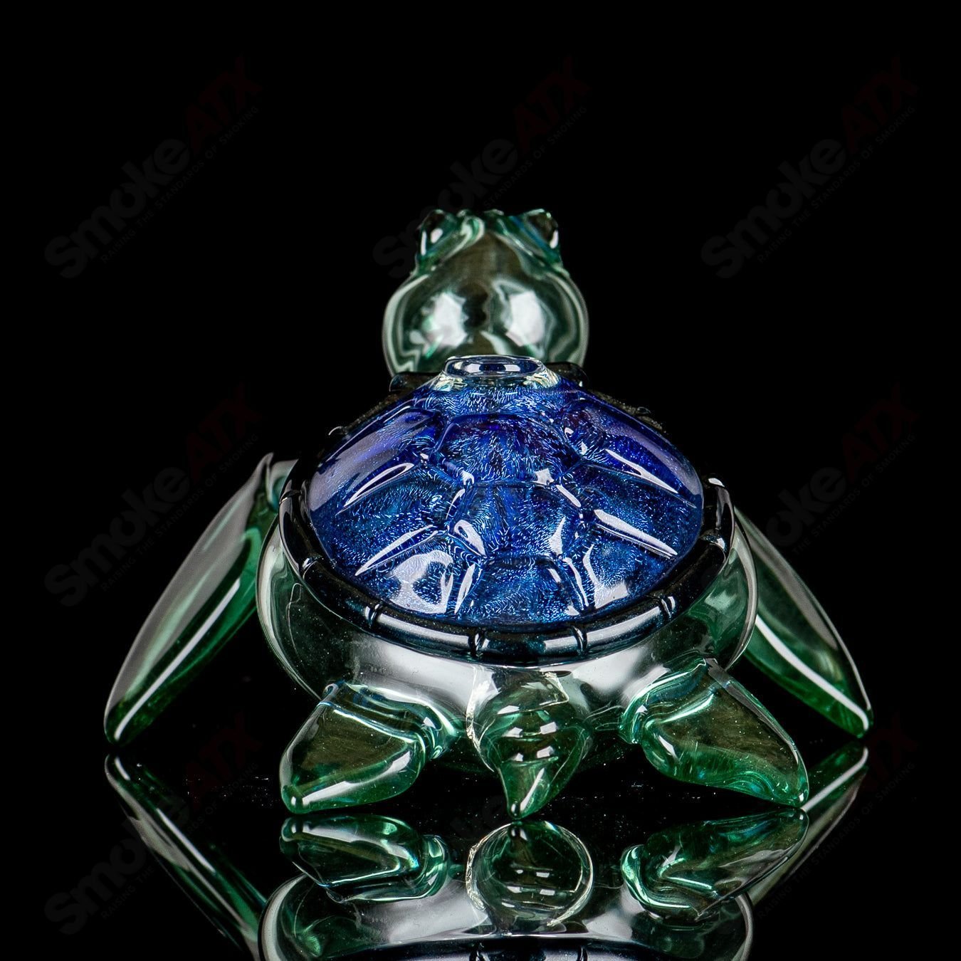 Blue Dichro Honu Sea Turtle rig by Turtle Time, a colorful heady glass concentrate rig featuring a turtle design and intricate glasswork.