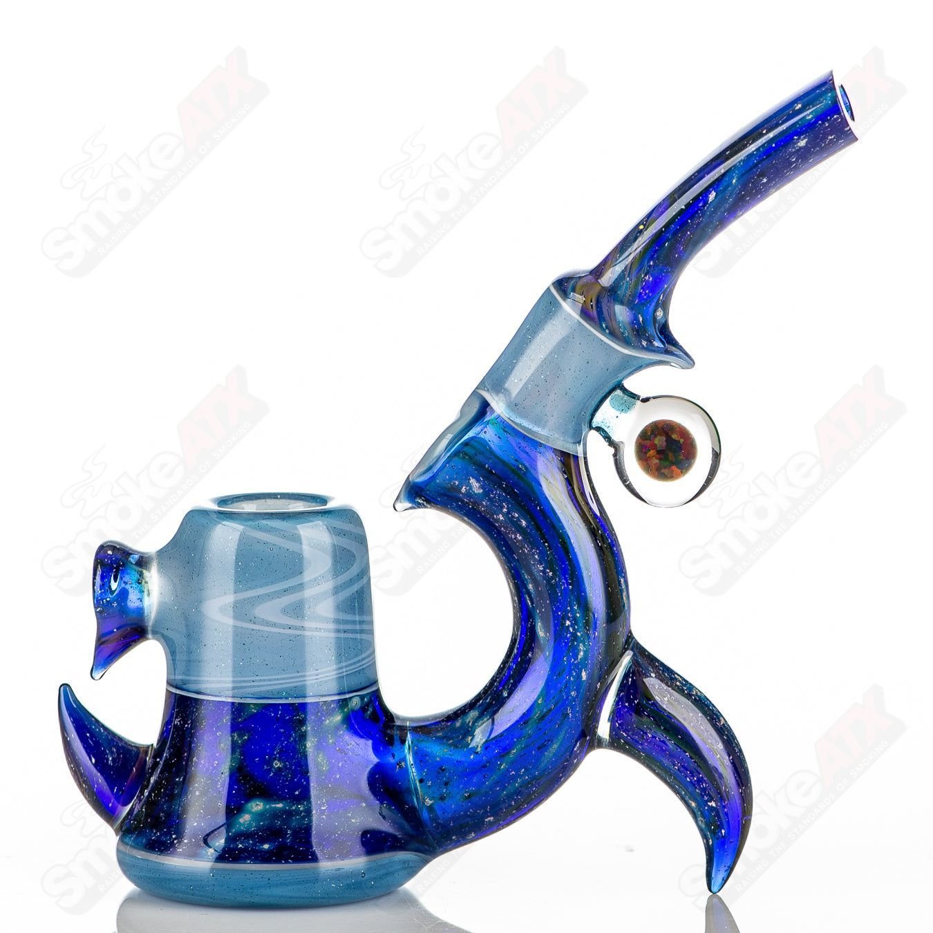 Blue Space Bub GK Melts hand pipe by GK Melts in a case, featuring a vibrant blue glass design and intricate space-themed details.