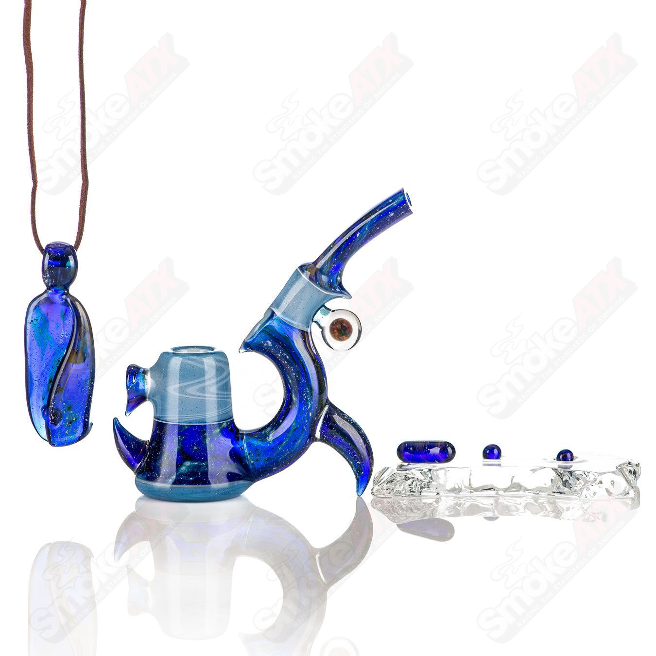 Blue Space Bub GK Melts hand pipe by GK Melts featuring a blue space design, displayed with a protective case.