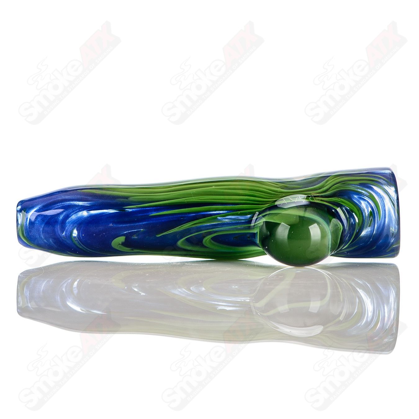 Blue and green worked glass chillum with clear dot signature, crafted by JMK Glass, featuring intricate color work and signature detail.