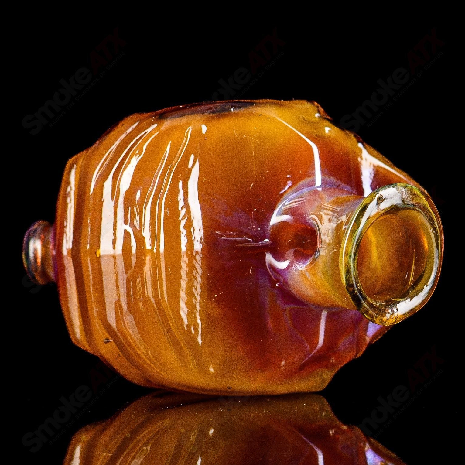 Glass Puffco Top Halo Pivot Mouthpiece by Tony Kazy, featuring clear glass design with a sleek, ergonomic shape.