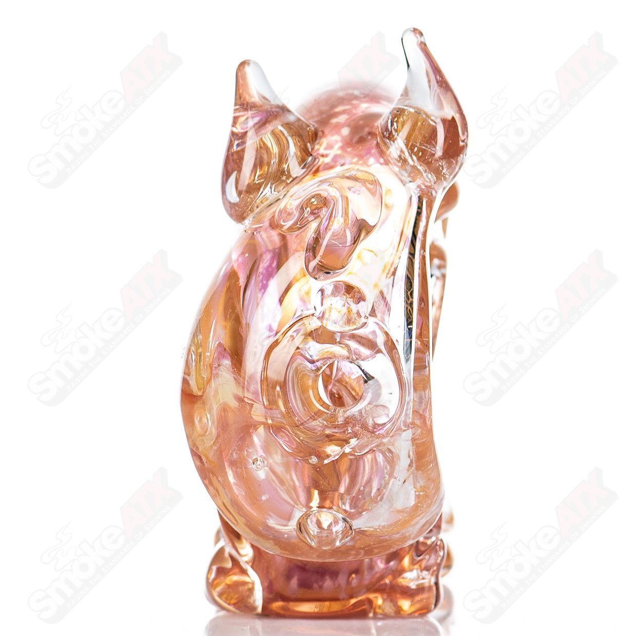 Glass pipe featuring a Buffalo Totem design in slag blood colors by Nobody, showcasing detailed glass artistry and vibrant patterns.