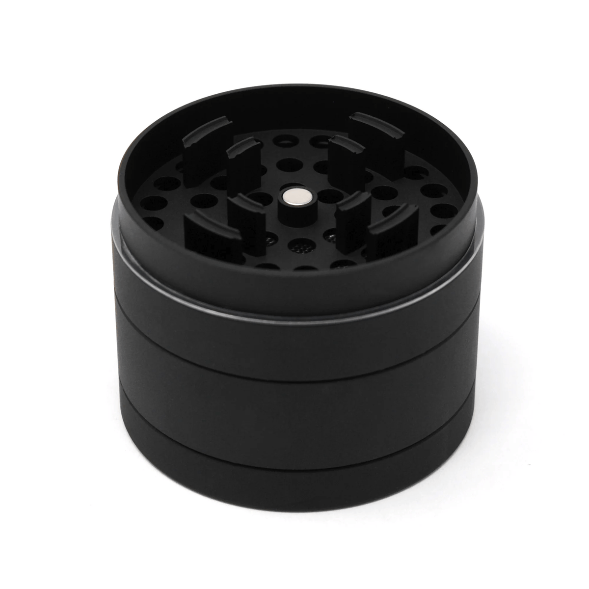 Cali Crusher 4-piece Homegrown Black metal grinder with textured grip and multiple chambers for herb grinding and storage.