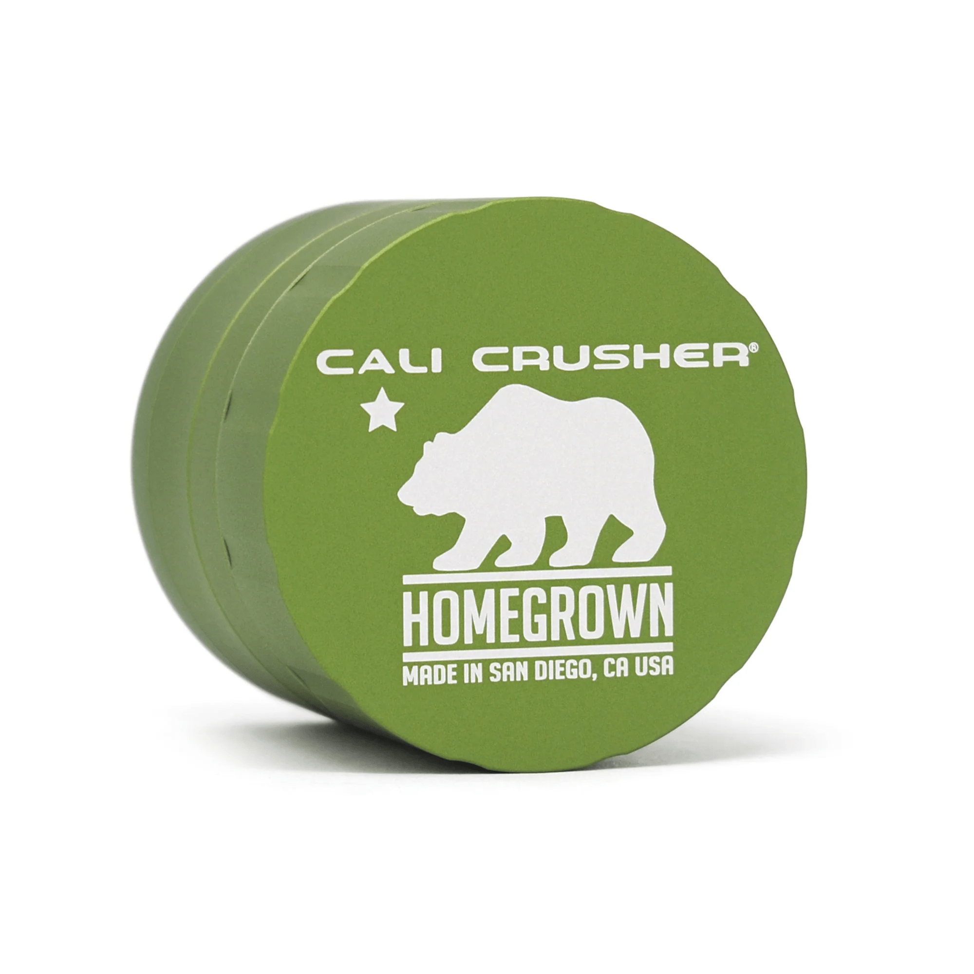 Cali Crusher 4-piece Homegrown Green metal grinder with sharp teeth and kief catcher for herb grinding.