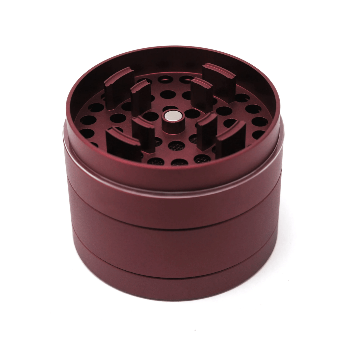 Cali Crusher 4-piece Homegrown Red metal grinder with textured grip and multiple compartments for grinding and storage.