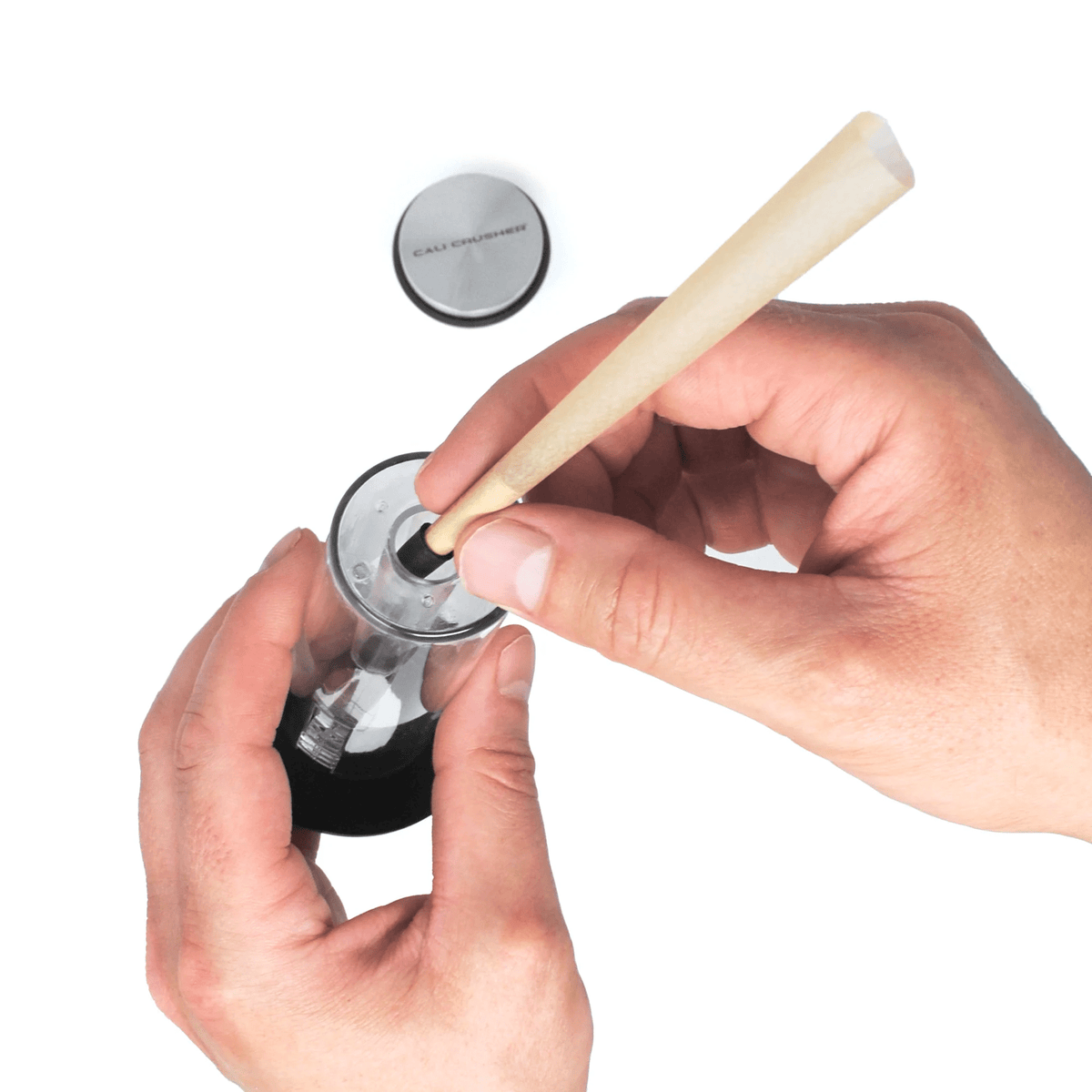Cali O.G. pre-roll grinder by Cali Crusher, compact metal grinder with multiple teeth for grinding pre-rolls and herbs.